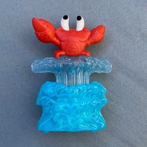 This is a little mermaid toy from Mc Donalds!